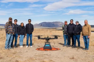 Aerobotics7 team and the EAGLE A7 drone platform at a testing site in Reno, Nevada.